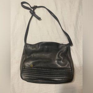 Black leather original retro 80s Etienne Aigner shoulder purse with a shimmer.